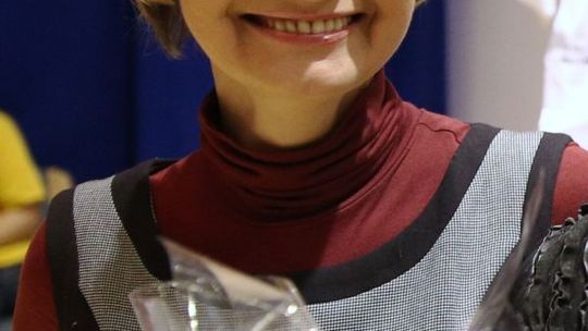 Ewa Dados z medalem Korczaka 