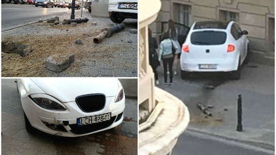 Krakowskie Przedmieście: Młoda kobieta przejechała przez słupki i wjechała w ścianę banku