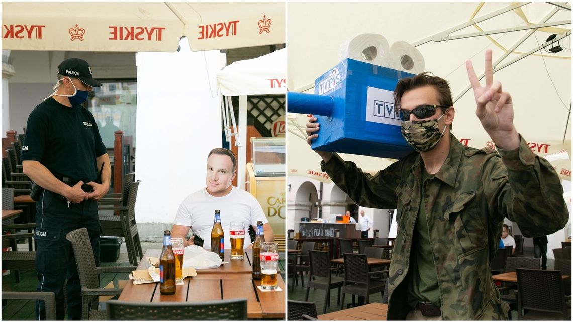 Maską i tekturową kamerą we władzę PiS. Happening przedsiębiorców na rynku w Zamościu