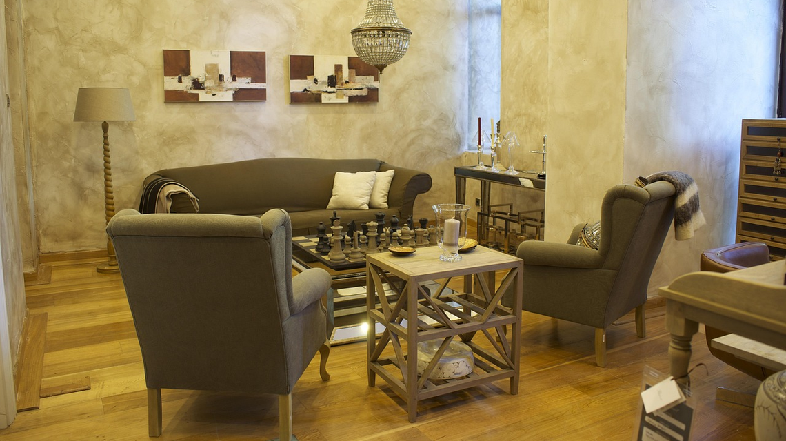 Modne i funkcjonalne fotele uszaki w domowych wnętrzach