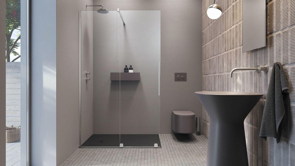 Urządzanie łazienki. Przesuwne drzwi pod prysznicem