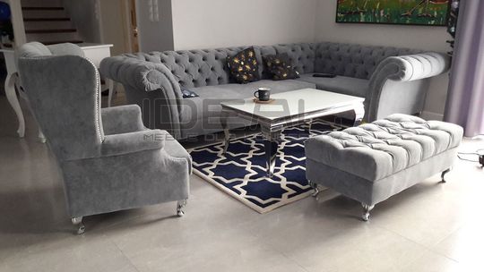 Pikowana sofa chesterfield to klasyczna elegancja w wystroju wnętrz 